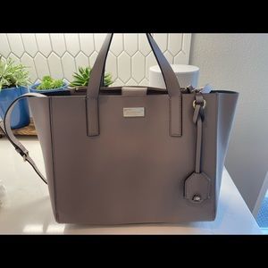 Authentic Kate Spade handbag. Shell Armazon style. Rarely used. Like new.